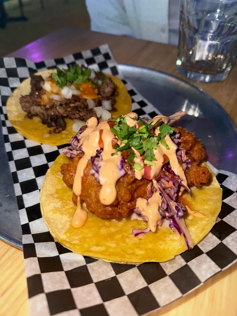 Crispy Baja fish taco with slaw, cilantro and chipotle mayo